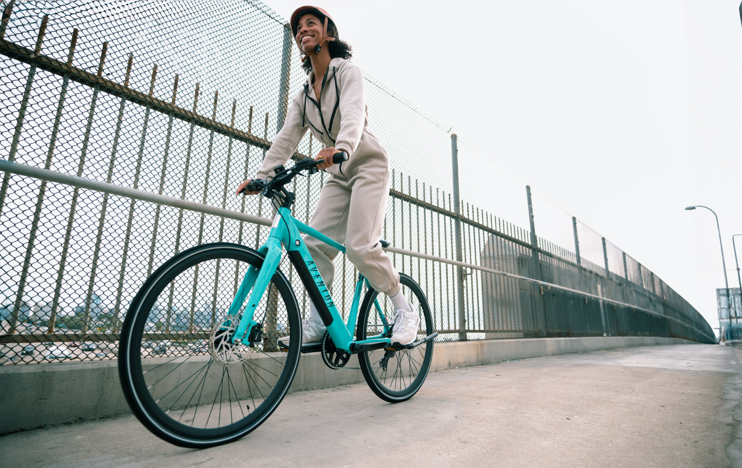 a woman riding a e-bike