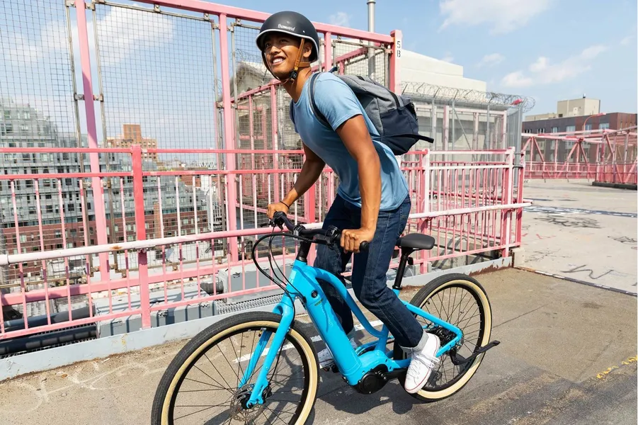 a man riding a e-bike
