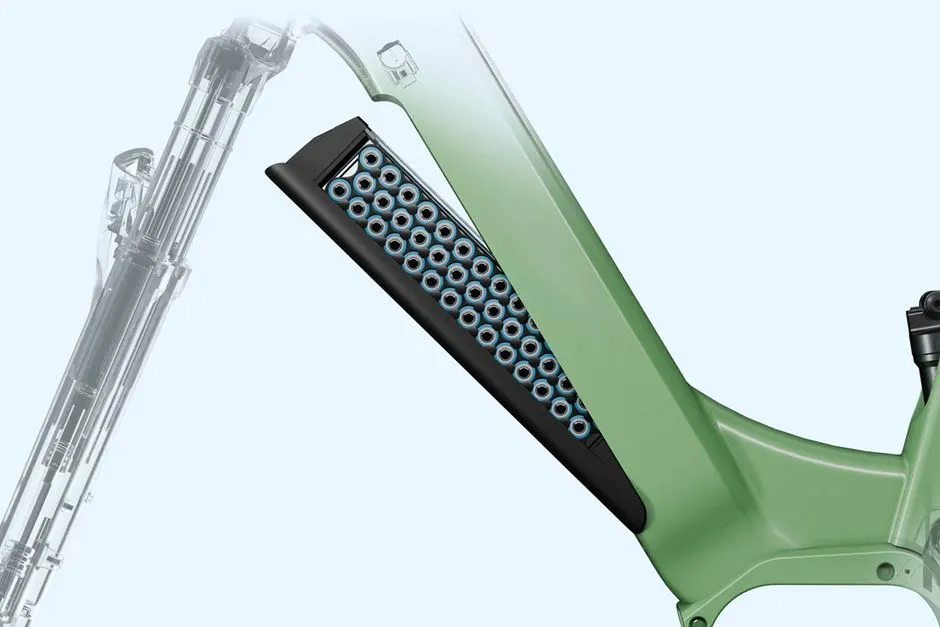 a green and black e-bike part