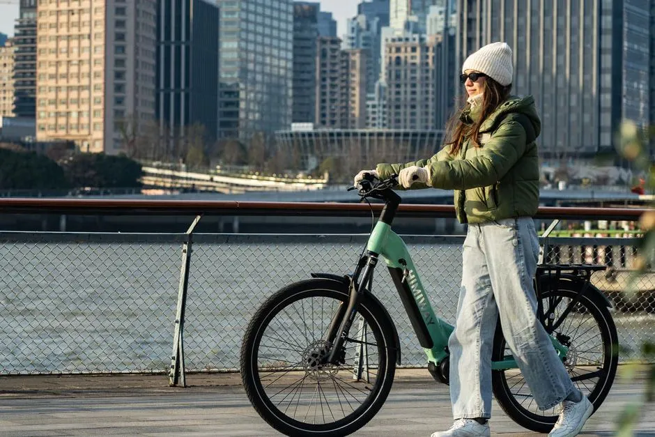 a woman on a e-bike